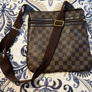 Brown and tan square saddle purse